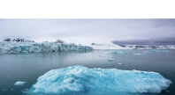 Forsiden av rapporten Sustainable Blue Economy in the Norwegian Arctic – Part 1: Status, med bilde av isfjell og isbre i arktisk landskap.